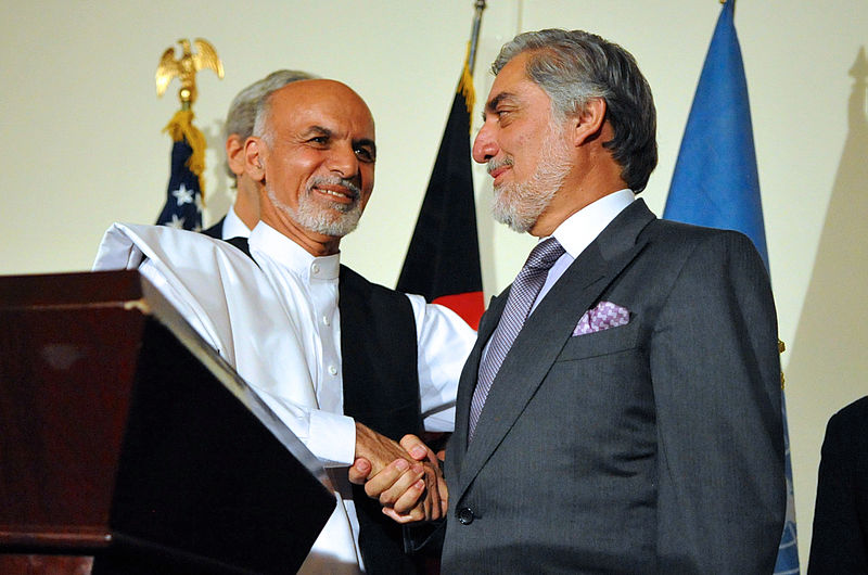 27 01 ashraf ghani shakes hands with abdullah abdullah